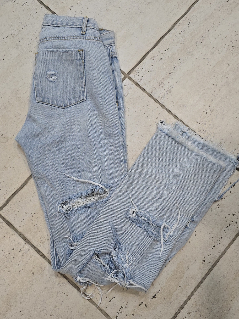 Alice + Olivia Light Wash Distressed Flare Jeans